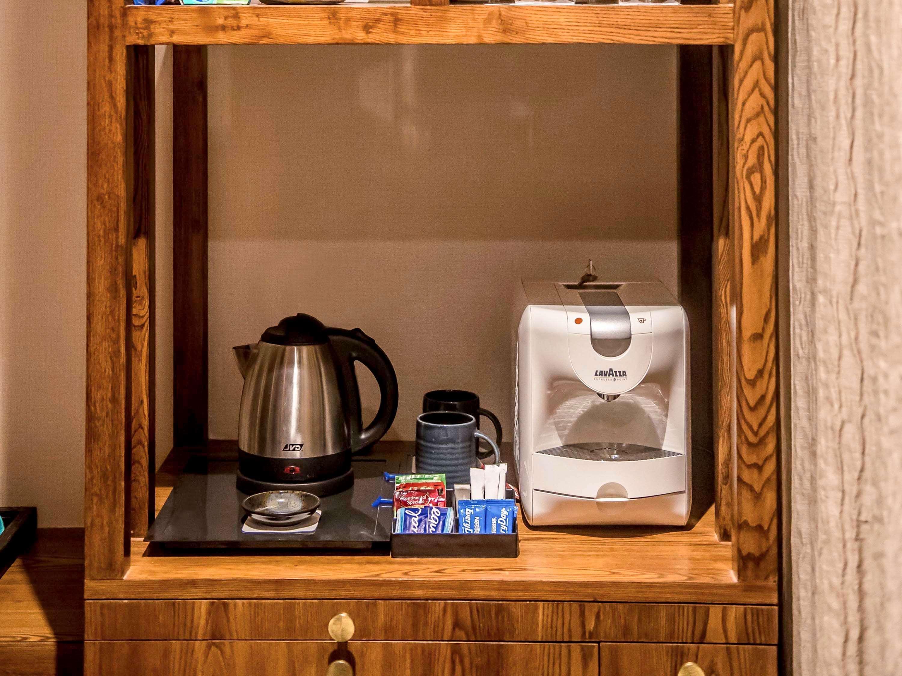 Novotel Goa Candolim Exterior photo A tea and coffee making station in a hotel room